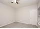 Simple bedroom with neutral walls and ceiling fan at 884 Lobdale Falls Dr, Lawrenceville, GA 30045