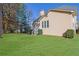 House exterior showcasing a beige finish and landscaping at 345 Devereux Downs, Roswell, GA 30075