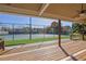 View of community tennis courts from a covered deck at 345 Devereux Downs, Roswell, GA 30075