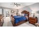 Comfortable bedroom with a wooden bed frame and access to a private bathroom at 46 Le Parc Fontaine, Lithonia, GA 30038