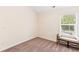 Bedroom with window seat, neutral carpeting, and window at 4940 Futral Dr, Acworth, GA 30101