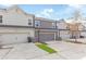 Row of townhouses showcasing attached garages and neat driveways at 4940 Futral Dr, Acworth, GA 30101