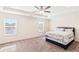 Large main bedroom with carpeted floors and ceiling fan at 4940 Futral Dr, Acworth, GA 30101