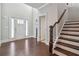 Bright entryway with hardwood floors and staircase at 622 Denali Dr, Mableton, GA 30126