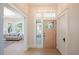 Light and airy entryway with hardwood floors and a view to living room at 335 4Th Ne St, Atlanta, GA 30308