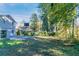 Private backyard with a basketball court and wooded area at 5382 Kemper Pl, Stone Mountain, GA 30088