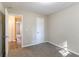 Spacious bedroom with carpet flooring and neutral walls at 5382 Kemper Pl, Stone Mountain, GA 30088