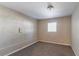 Simple bedroom with carpeted floor and a window at 5382 Kemper Pl, Stone Mountain, GA 30088
