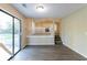 Bright dining area with hardwood floors and view to living room at 5382 Kemper Pl, Stone Mountain, GA 30088