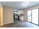 Open kitchen with white cabinets, granite countertops, and stainless steel appliances at 5382 Kemper Pl, Stone Mountain, GA 30088