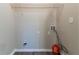 Laundry area with shelving and hookups for washer/dryer at 5382 Kemper Pl, Stone Mountain, GA 30088