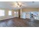 Living room with hardwood floors, vaulted ceiling and loft overlook at 5382 Kemper Pl, Stone Mountain, GA 30088