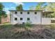 White brick ranch house with covered patio at 1703 Barrett Nw Dr, Atlanta, GA 30318