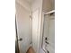 Clean bathroom with a tub and shower, linen closet, and updated fixtures at 2815 Highway 20 Se, Conyers, GA 30013