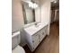 Bathroom with quartz countertop and new fixtures at 2815 Highway 20 Se, Conyers, GA 30013