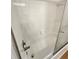 Clean white bathtub with sliding glass door at 2815 Highway 20 Se, Conyers, GA 30013