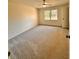 Bright bedroom featuring new carpet and large window at 2815 Highway 20 Se, Conyers, GA 30013