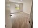 Simple bedroom with neutral carpet at 2815 Highway 20 Se, Conyers, GA 30013