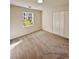 Well-lit bedroom with new carpet and window at 2815 Highway 20 Se, Conyers, GA 30013