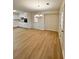 Bright dining area with light wood flooring and chandelier at 2815 Highway 20 Se, Conyers, GA 30013