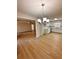 Bright dining room with chandelier and hardwood floors at 2815 Highway 20 Se, Conyers, GA 30013