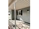 Inviting front porch with white railings and a light gray exterior at 2815 Highway 20 Se, Conyers, GA 30013