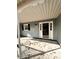 Inviting front porch with white door and black shutters at 2815 Highway 20 Se, Conyers, GA 30013