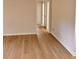 Light and bright hallway with light wood flooring at 2815 Highway 20 Se, Conyers, GA 30013