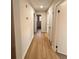 Light and bright hallway with light wood flooring at 2815 Highway 20 Se, Conyers, GA 30013