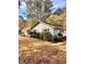 Side view of a light blue house with landscaping at 2815 Highway 20 Se, Conyers, GA 30013