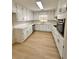 Updated kitchen with white cabinets and quartz countertops at 2815 Highway 20 Se, Conyers, GA 30013