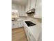 Renovated kitchen with white cabinets, quartz countertops and new appliances at 2815 Highway 20 Se, Conyers, GA 30013