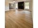 Bright living room with a modern fireplace and light wood floors at 2815 Highway 20 Se, Conyers, GA 30013