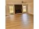 Bright living room with a modern fireplace and light wood floors at 2815 Highway 20 Se, Conyers, GA 30013