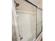 Bathroom with a tub and shower, and glass sliding doors at 2815 Highway 20 Se, Conyers, GA 30013