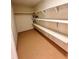 Storage room with built-in shelving at 2815 Highway 20 Se, Conyers, GA 30013