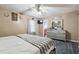 Main bedroom with king bed, dresser, and access to the bathroom at 916 Marshall Fuller Rd, Dallas, GA 30157