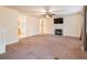 Living room with a fireplace, carpeted flooring, and neutral walls at 1176 Hardin Bridge Rd, Euharlee, GA 30145