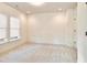 Spacious bedroom with neutral carpet and large windows at 674 Exchange Se St, Atlanta, GA 30315