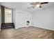 Finished basement with vinyl flooring and ceiling fan at 519 S Dogwood St, Villa Rica, GA 30180