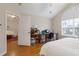 Bedroom with hardwood floors, and a view of living room at 6110 Malloway Ct, Cumming, GA 30041