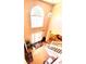 Two-story foyer with hardwood floors, a chandelier, and a view of the living area at 408 Othello Dr, Hampton, GA 30228