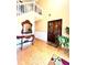 Bright and spacious entryway with hardwood floors and double doors at 408 Othello Dr, Hampton, GA 30228