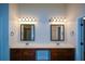 Double vanity bathroom with two large mirrors at 168 Waypoint Dr, Stockbridge, GA 30281