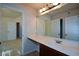 Shared bathroom with double vanity and plenty of counter space at 168 Waypoint Dr, Stockbridge, GA 30281