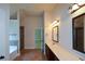 Double vanity bathroom with a view into another room at 168 Waypoint Dr, Stockbridge, GA 30281