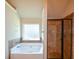 Bathroom with garden tub and walk in shower at 168 Waypoint Dr, Stockbridge, GA 30281