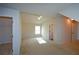Spacious bedroom with vaulted ceiling, ceiling fan, and walk-in closet at 168 Waypoint Dr, Stockbridge, GA 30281