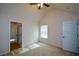 Well-lit bedroom featuring a vaulted ceiling and ceiling fan at 168 Waypoint Dr, Stockbridge, GA 30281