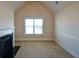 Bedroom with fireplace and window at 168 Waypoint Dr, Stockbridge, GA 30281